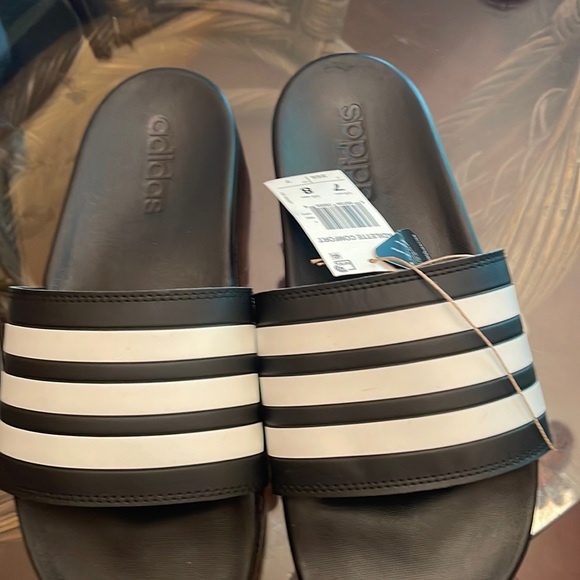 adidas Shoes - Brand new with tag size 8 women size 7 men unisex flip flops Adidas brand.